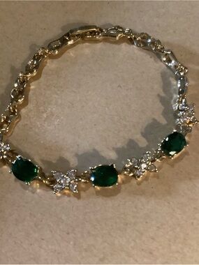 Gold Bracelet with Emerald Green Stones and Clear Accents $20.00